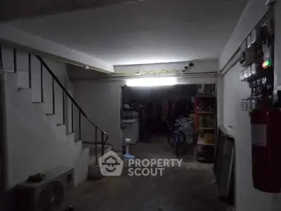 Spacious basement area with storage potential and utility access, ideal for creative renovation.