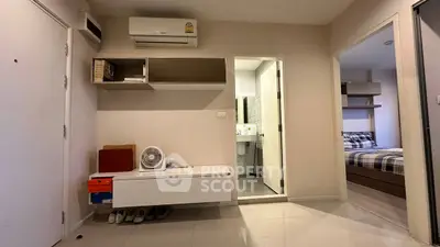 Modern apartment interior with air conditioning and bedroom view