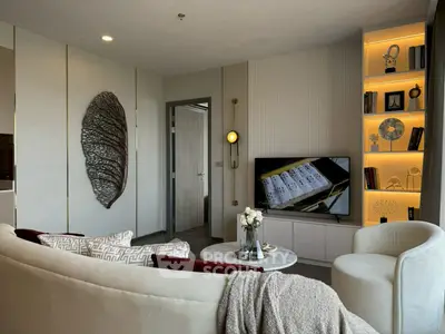 Stylish modern living room with elegant decor and built-in shelving