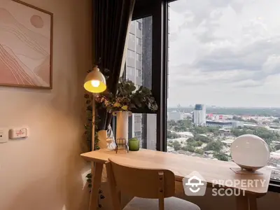 Modern study nook with city view, stylish desk, and elegant decor