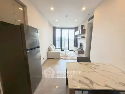 Modern living room with city view, sleek furniture, and open layout in a high-rise apartment.