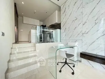Modern kitchen with sleek marble design and integrated appliances