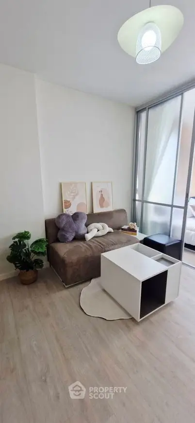 Modern living room with cozy sofa and stylish decor