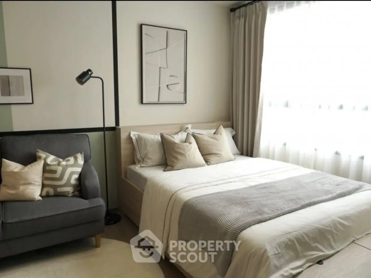 Cozy bedroom with modern decor and natural light