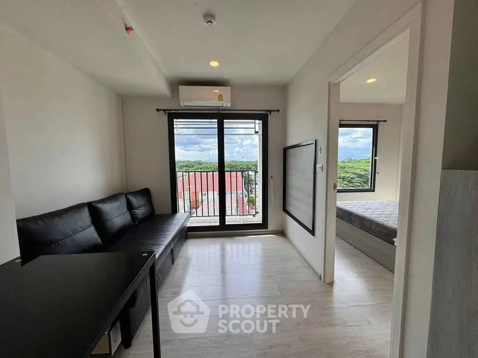 Modern living room with balcony and scenic view in stylish apartment