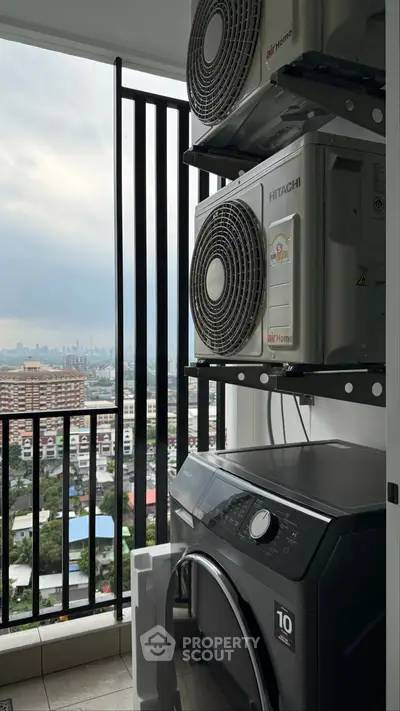 Modern apartment balcony with city view and air conditioning units