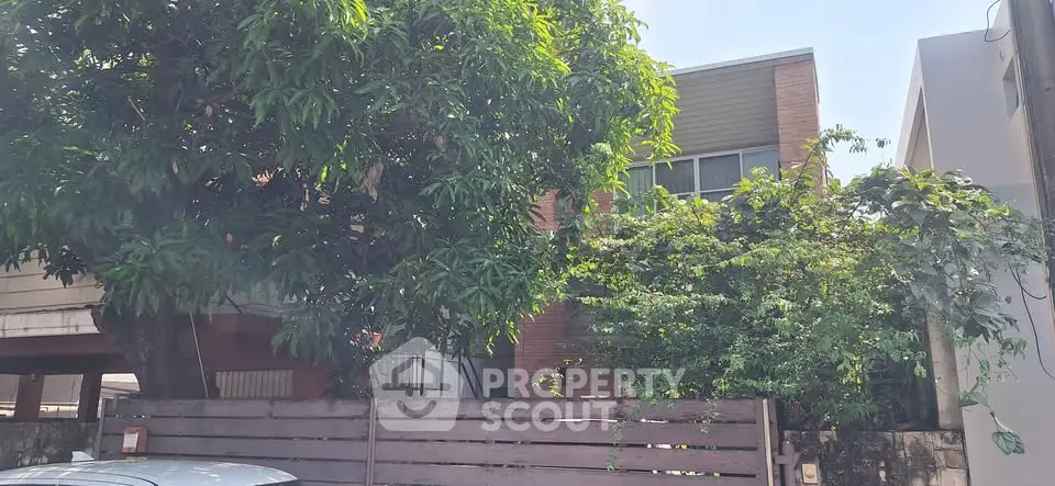 Charming residential property with lush greenery and modern architecture