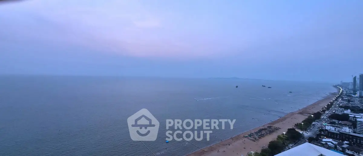Stunning ocean view from high-rise building at sunset