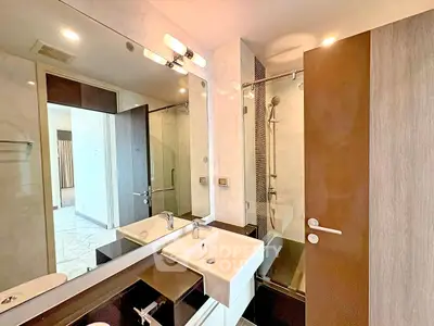 Modern bathroom with sleek fixtures and stylish design in a contemporary apartment.