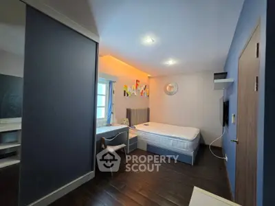Modern bedroom with stylish decor and cozy ambiance