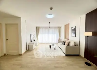 Spacious modern living room with elegant decor and natural light