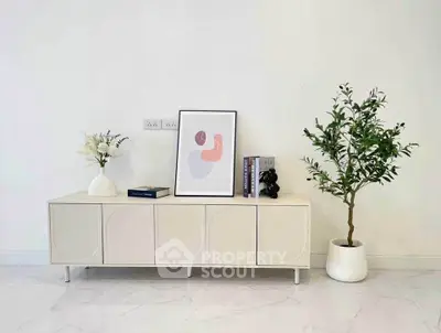 Stylish modern living room with minimalist decor and elegant sideboard