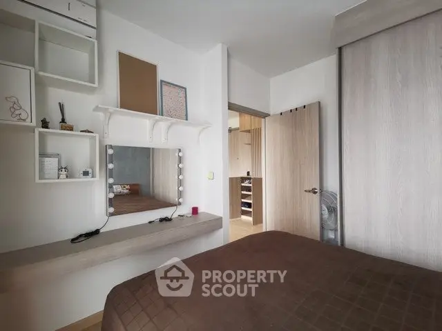 Cozy bedroom with modern decor and built-in storage solutions