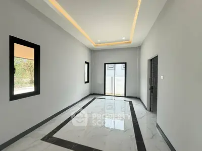 Modern interior with sleek marble flooring and recessed lighting