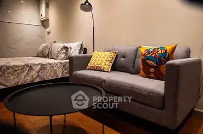 Cozy studio apartment with modern sofa and stylish decor
