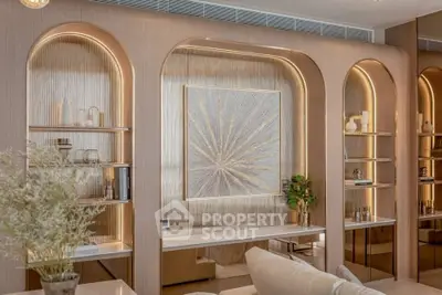 Luxurious living room with elegant decor and built-in shelving, featuring ambient lighting and modern artwork.