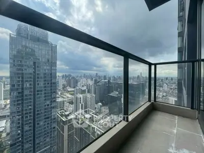 Stunning cityscape view from a modern high-rise balcony, perfect for urban living.