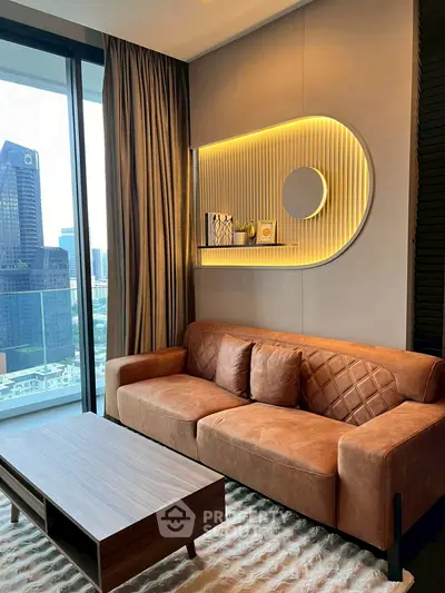 Modern living room with stylish leather sofa and city view from balcony