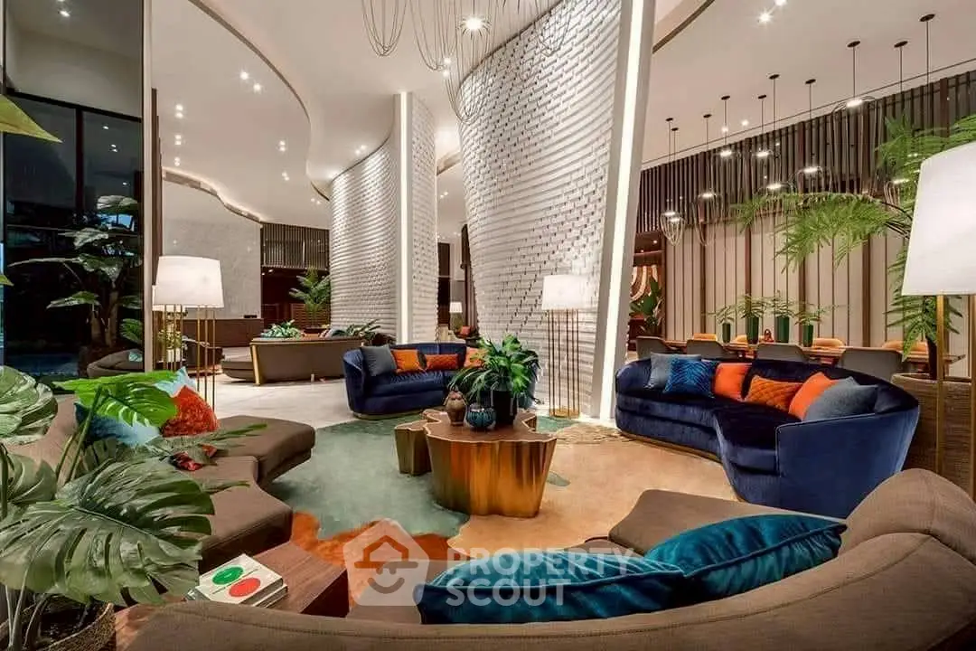 Luxurious modern living room with elegant decor and plush seating in a stylish open layout.