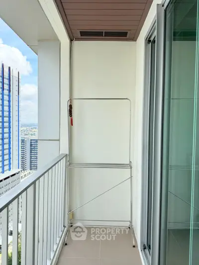 Modern balcony with city view, perfect for relaxation and enjoying the skyline.
