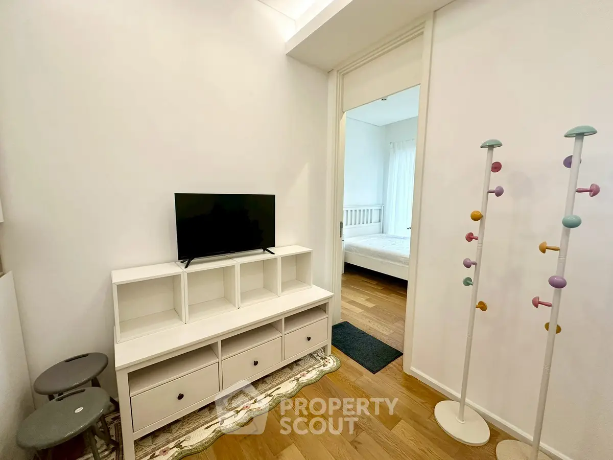 Modern apartment interior with stylish furniture and cozy bedroom view.