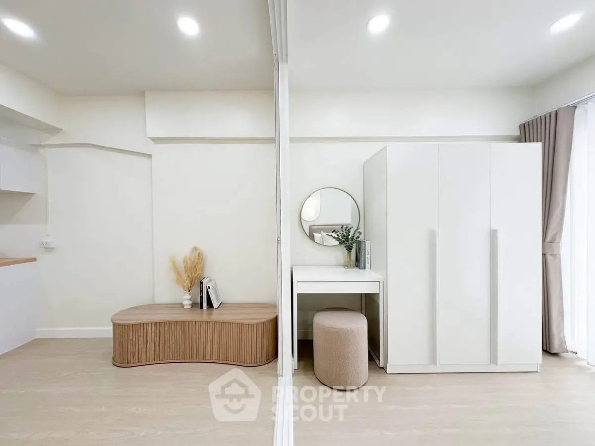 Modern minimalist bedroom with stylish furniture and natural light