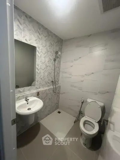 Modern bathroom with sleek tiles and minimalist design