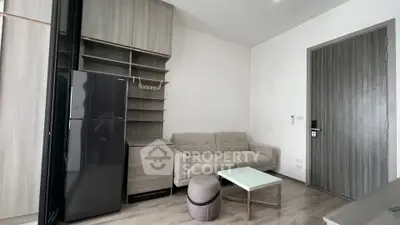 Modern living room with sleek furniture and built-in storage