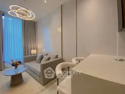 Modern living room with elegant lighting and cozy seating area