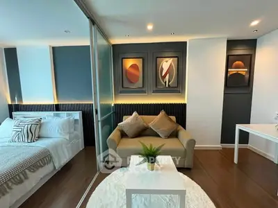 Modern studio apartment with stylish decor and cozy living area