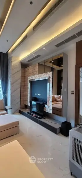 Luxurious modern living room with marble accents and sleek entertainment center