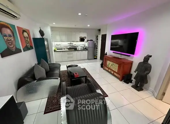 Modern living room with unique decor and open kitchen layout