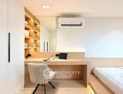 Modern bedroom with built-in desk and stylish decor