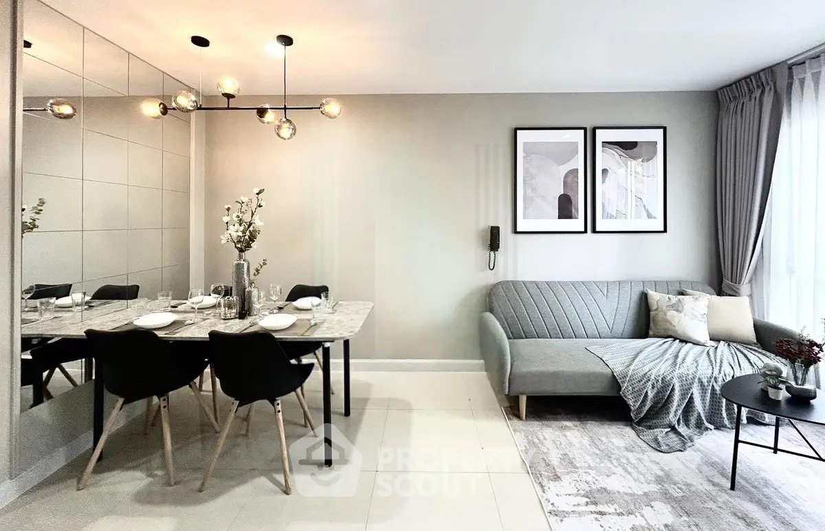 Modern living room with stylish decor, dining area, and cozy seating, perfect for urban living.