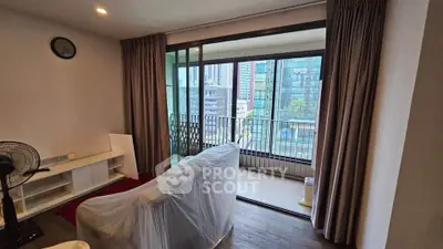 Modern living room with balcony view in urban apartment