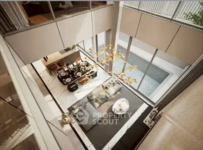 Luxurious open living room with pool view and elegant chandelier