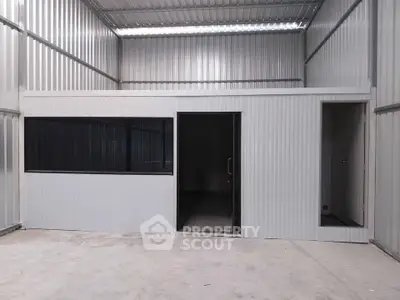 Modern industrial storage unit with sleek metal design and spacious interior.