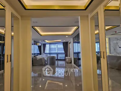 Luxurious modern living room with elegant lighting and large windows