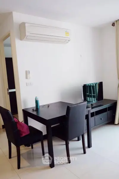 Modern living room with sleek furniture and air conditioning