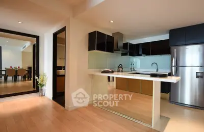 Modern open kitchen with sleek design and stainless steel appliances