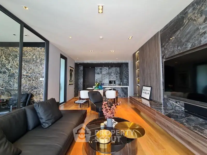 Luxurious modern living room with marble accents and sleek furnishings