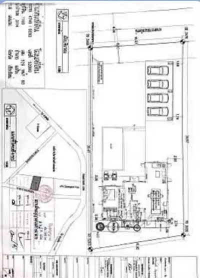 Detailed architectural site plan with parking layout and building design.