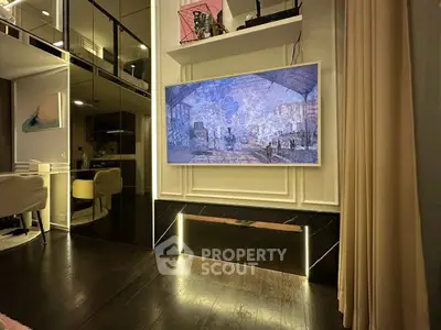 Luxurious modern living room with elegant decor and large wall-mounted TV
