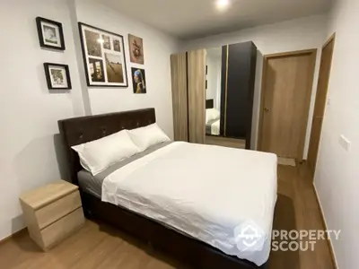 Cozy bedroom with modern decor and ample storage space