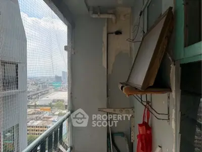 High-rise balcony with city view, potential for renovation and personalization.