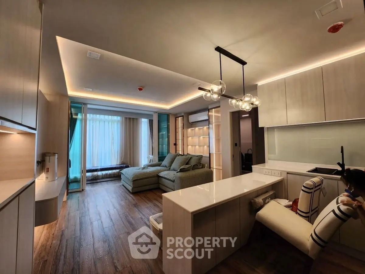 Modern living room with stylish lighting and open layout