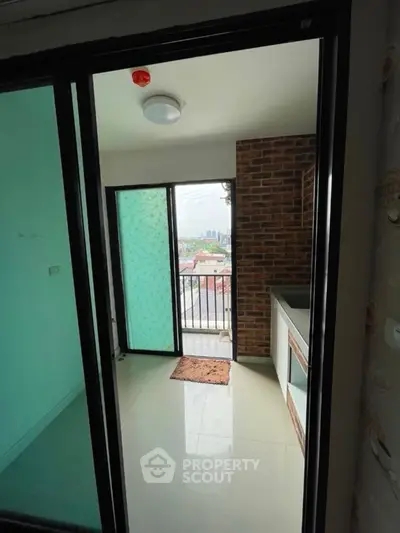 Charming balcony with city view and brick accent wall