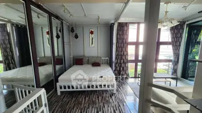 Stylish bedroom with large windows and modern decor