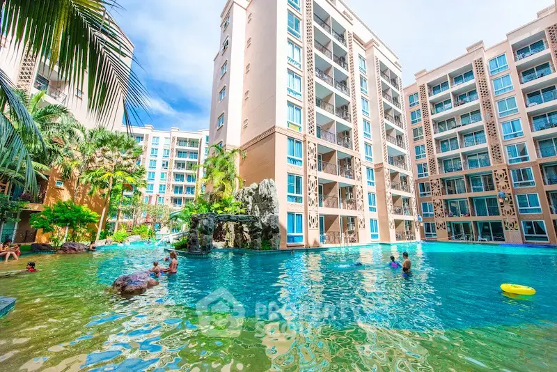 Luxurious condominium with stunning pool and lush landscaping