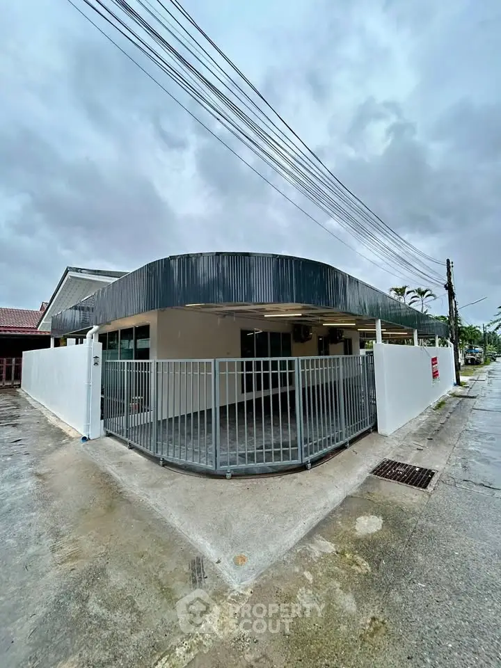 Modern corner unit house with sleek design and spacious outdoor area